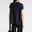 Comfortable Women’s Denim Top – Casual Short Sleeve Daily Wear tops Person wearing a dark blue shirt and pants on a white background